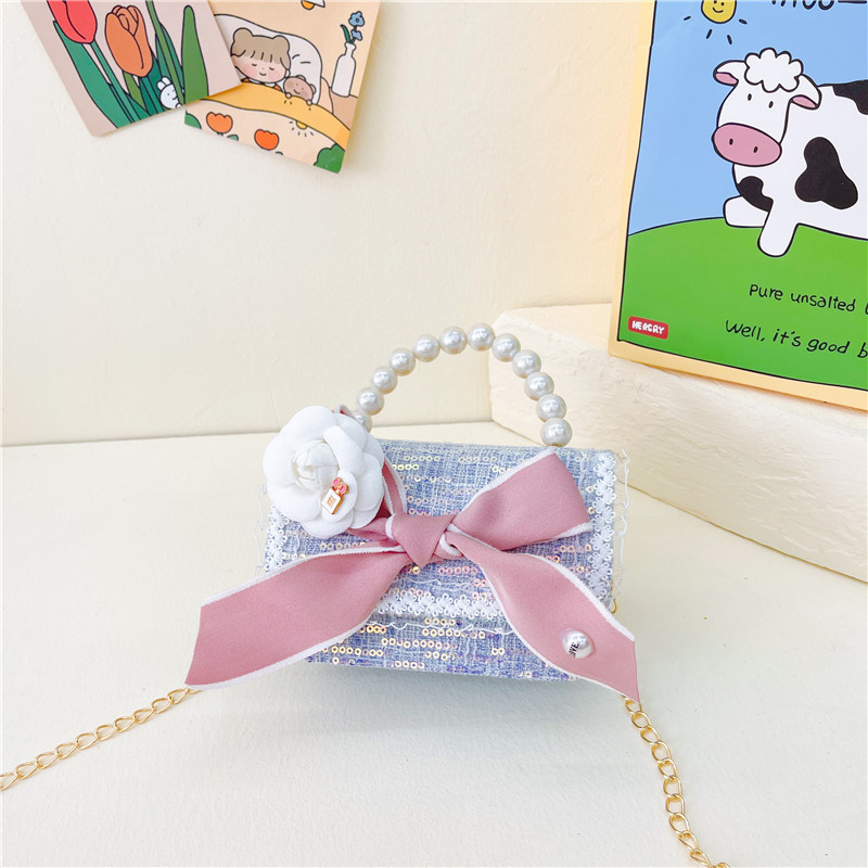 Bolso de los nuevos niños al por mayor bolso de princesa Linda pequeña flor arco accesorios bolsa versátil bolsa de mensajero de las muchachas