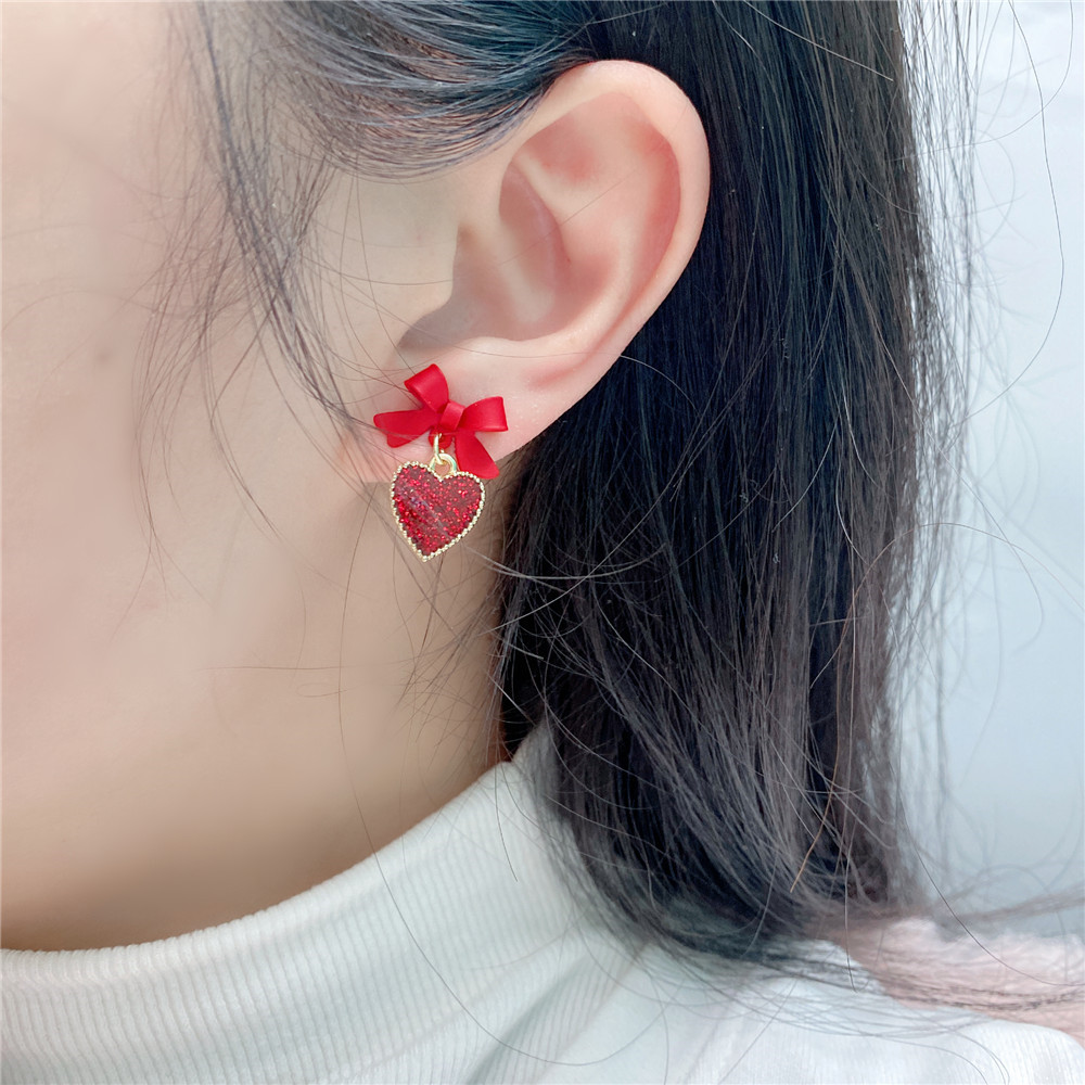 Simple Red Heart Earrings Cute Korean Bow Alloy Drop Earrings display picture 1