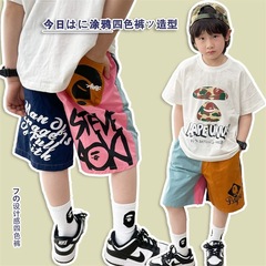 2024 Summer Set for Boys: Striped Graffiti-Fashion Five-Pocket Trousers with Round Neck Short Sleeve Streetwear Japanese Style Set for Older Children, Two-Piece Children's Clothing