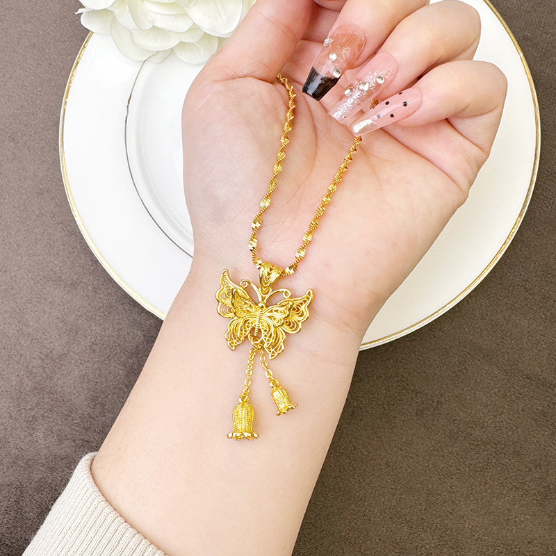 Tendencia nacional Vietnam Colgante de oro de arena Estilo de palacio Mariposa Colgante de borla de lirio de los valles Estilo chino Joyería de alta gama de todo fósforo