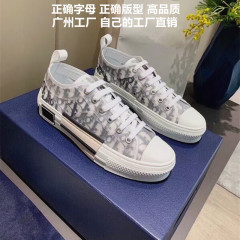B 23厚い底のカジュアルな低い靴2025春の高品質のD字の古い花の透明なキャンバスの靴の男女は同じです。