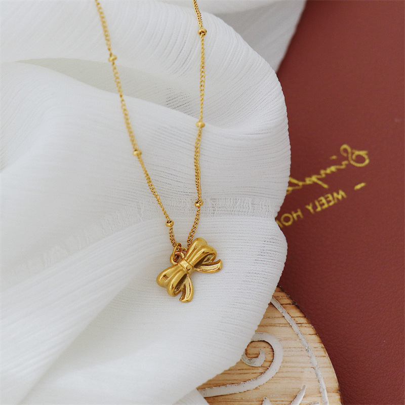 Sweet Simple Style Bow Knot Titanium Steel Plating Pendant Necklace display picture 3