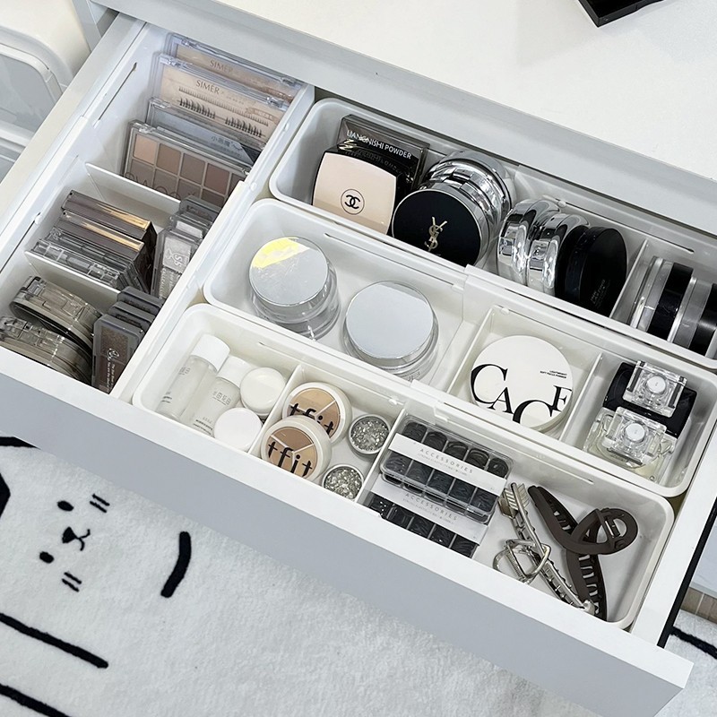 Telescopic cosmetic storage box, storage system, brush, dressing table, lipstick