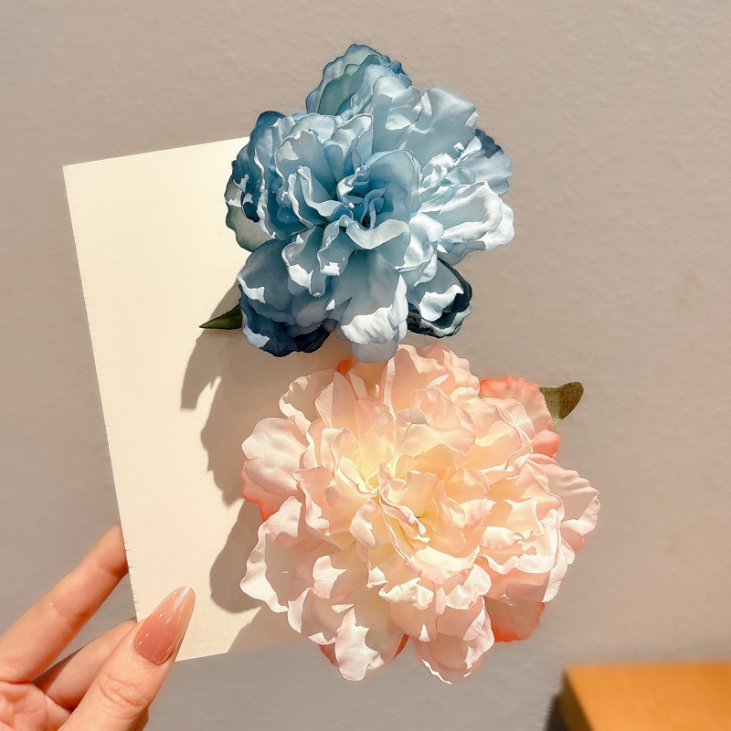 Super Fairy Flower Horquilla Lado femenino 2025 Nuevo estilo Atmósfera Clip de pico de pato con flequillo para niños Tombro de horquilla de sentido avanzado