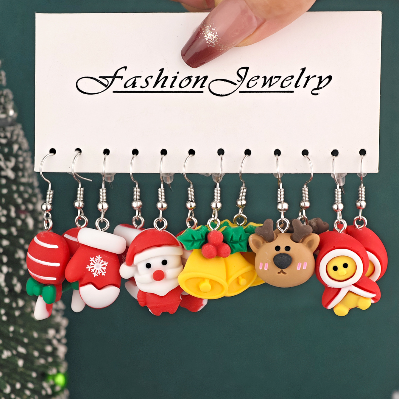 12pcs transfronterizos venta caliente pendientes de Navidad creativos Papá Noel muñeco de nieve lindo pequeño alce set de regalo