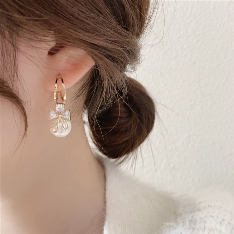 fashion pearl diamond bow earrings simple alloy earringspicture1