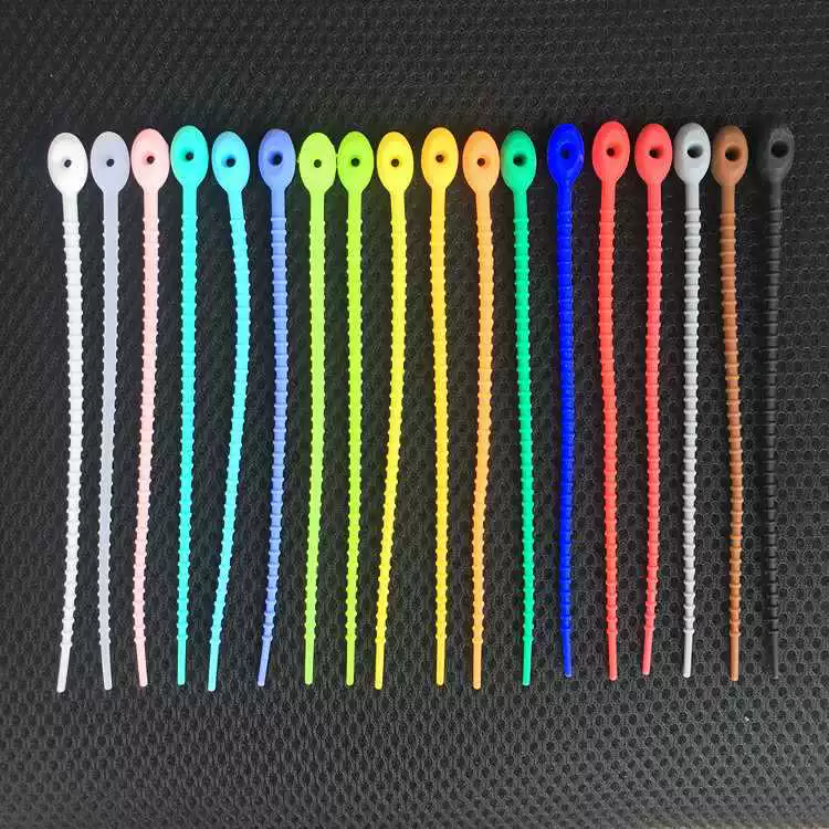 Cartoon storage system on a lace, keychain, multi-use elastic belt