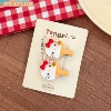 White racket for table tennis, hairgrip, kitten