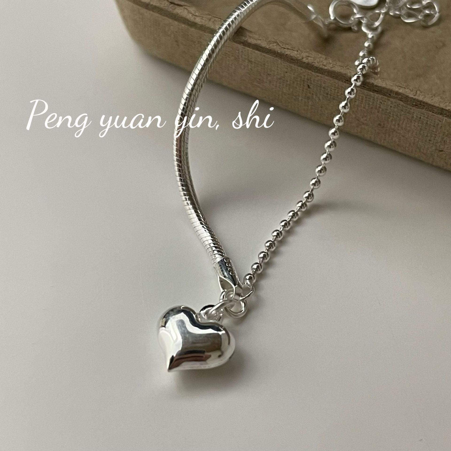 Bracciale a forma di cuore in argento sterling per donna, stile Niche Ins, design asimmetrico, leggero, sensazione di alta qualità, coreano_voghion.com