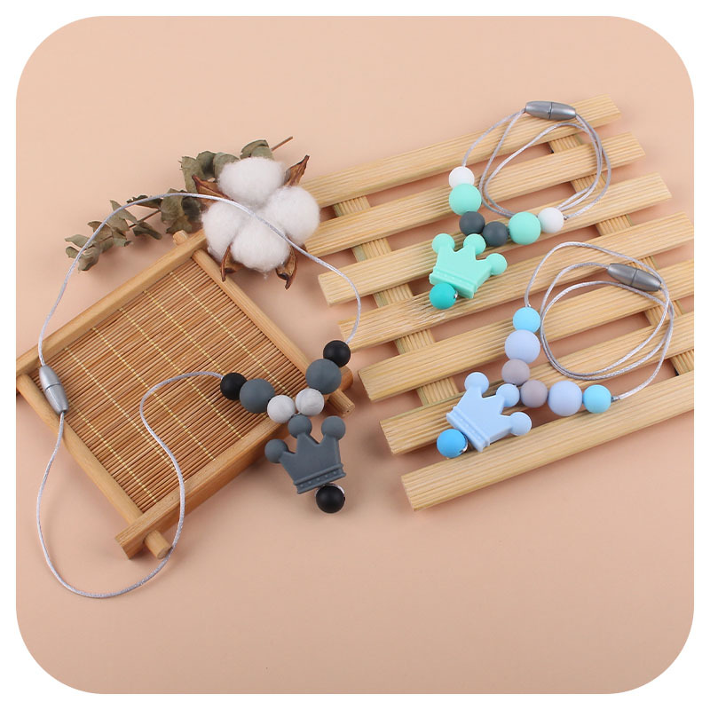 Amazon nuevo silicona corona molar collar bebé suministros teether palo masticable colgante collar