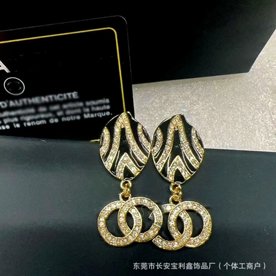 Yaxa sancaqları high-end, light-luxury feel, black and - gold-and-black-oil-drop-earrings-in-stock-high-quality