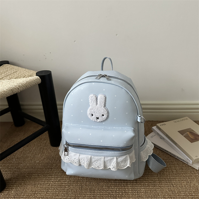 Nuevo variante lindo cordón ondulado dulce punto ondulado de color sólido pequeño conejo de viaje de estilo coreano mochila de viaje para mujeres
