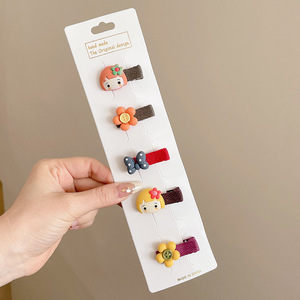 Hermosos clips de cabello de color para niños coreanos de alto nivel sensación de arco de niñas bolsa de tela no daña clips de cabello de bebé