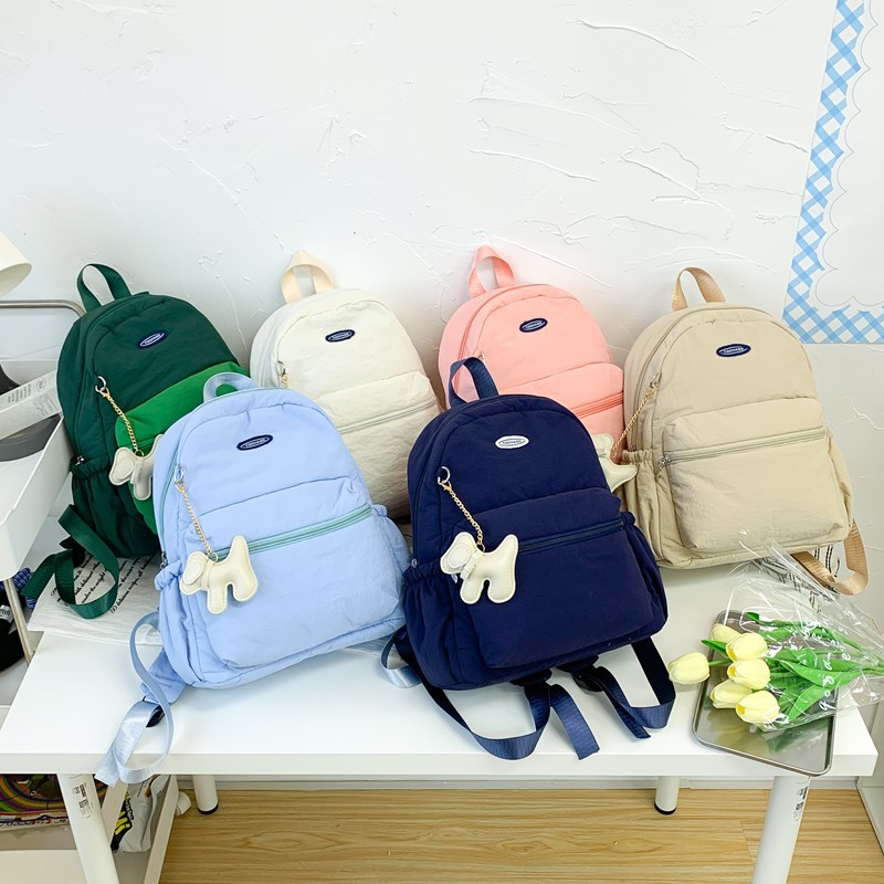 Mochila deportiva de ocio al aire libre para niños y niñas, mochila escolar de gran capacidad, nueva mochila de viaje para niños de color sólido