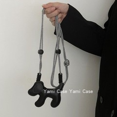 携帯電話のバッククリップの斜め掛け紐ins韓風アニメの黒い耳の犬のかわいい少女の携帯電話のクリップは通用します。