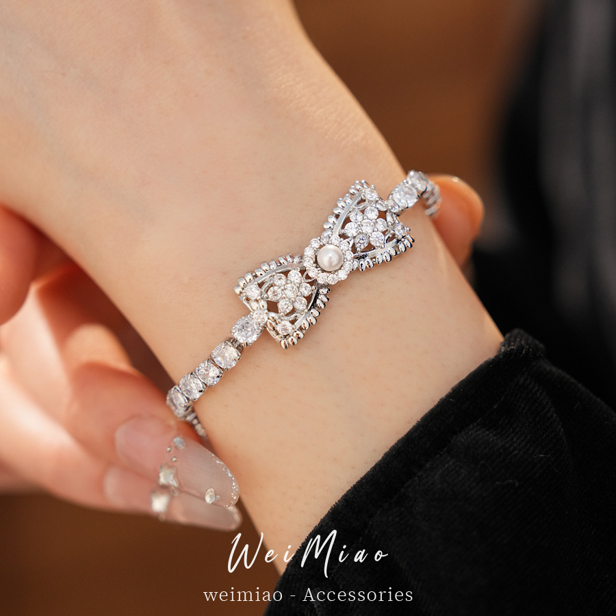 Zircon plata perla pulsera arco pulsera de moda coreana dulce y fresco pulsera de lujo ligera alta sensación de joyas de mano versátiles mujeres