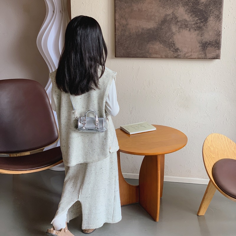 Coreano simple color sólido bolsas de hombro para niños y niñas bolsas de cilindro mini compactas para bebés bolsas de almohada para niños de comercio exterior transfronterizo