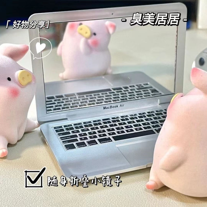 創意ミニコンピュータの小さい鏡のノートパソコンは身につけて形の携帯を持ってリンゴの化粧鏡の鏡を折り畳みます。|undefined
