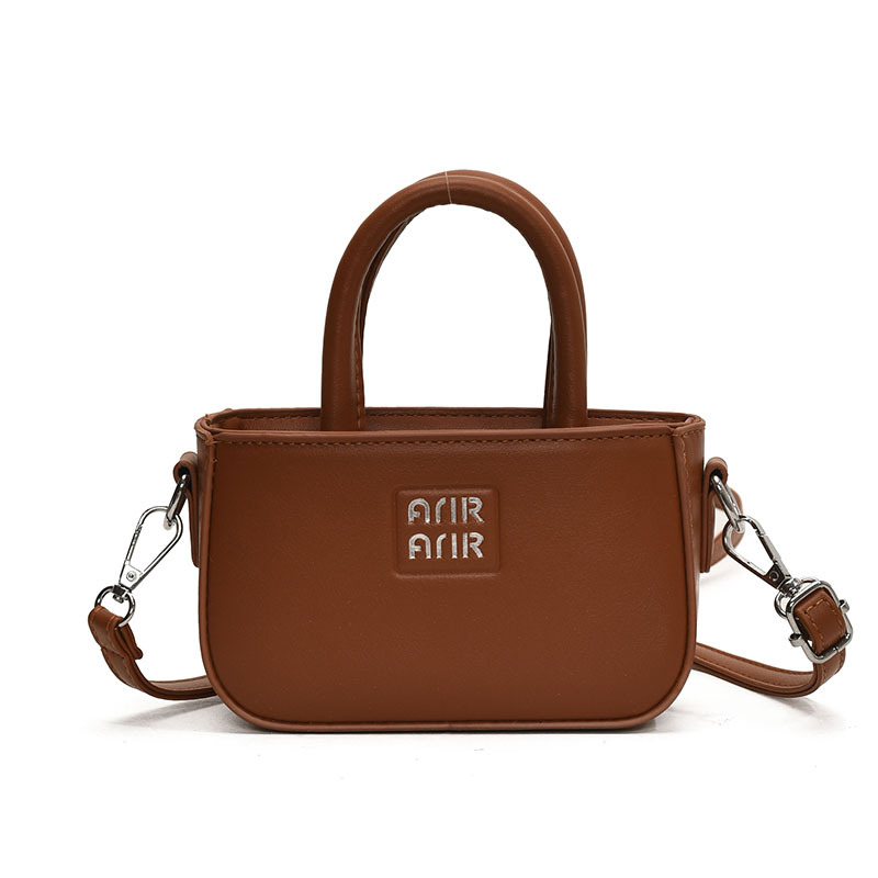 Coreana para niños y niñas bolsos pequeños, mini lindos bolsos de bebé de color sólido de moda 2025 nuevos niños bolsos de hombro