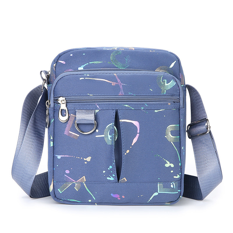 Nueva bolsa de mensajero de las mujeres bolsa pequeña de nylon Oxford bolsa de tela multi-compartimiento pequeña bolsa de mediana edad casual bolsa de hombro ventas directas de la fábrica