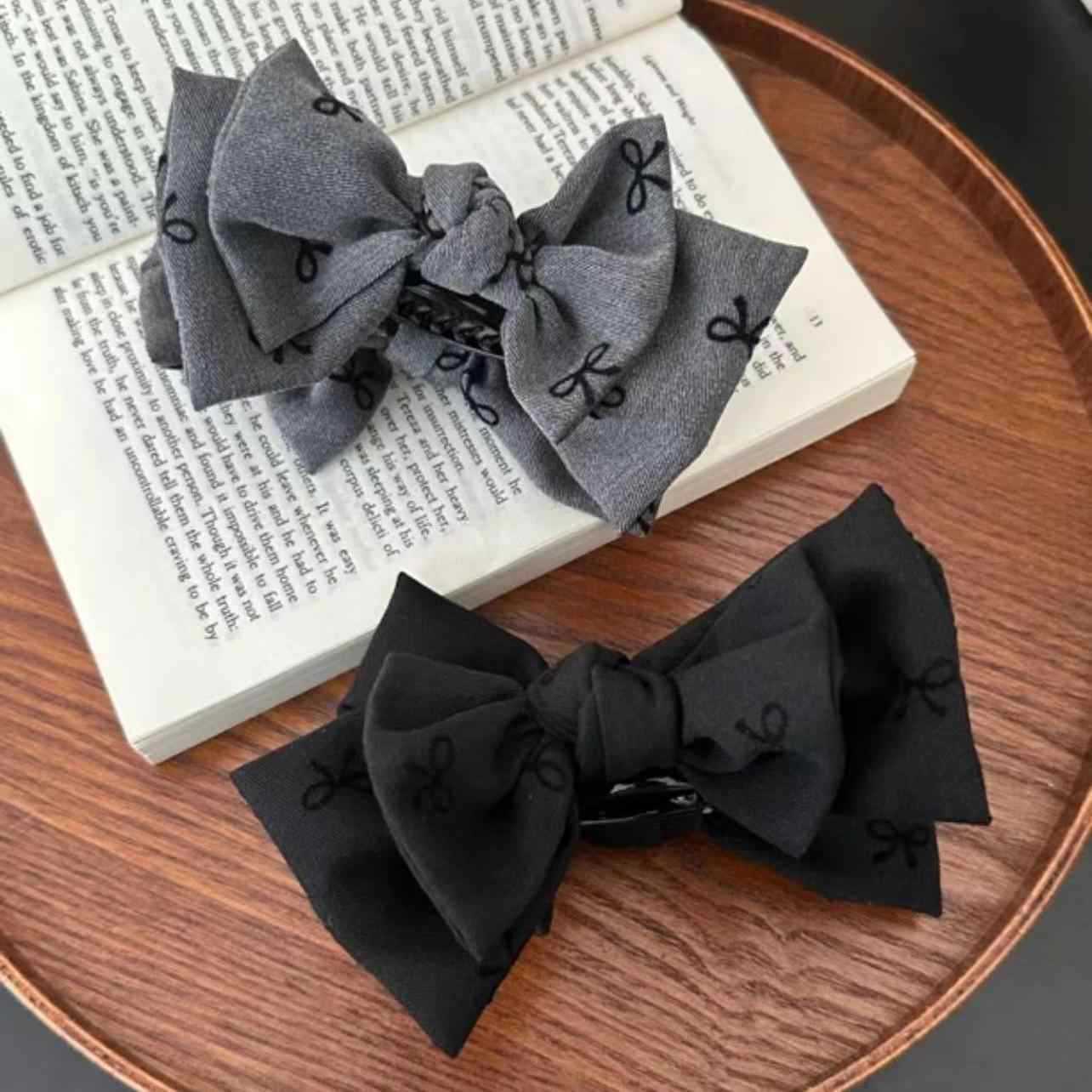 2025 nueva sensación de alto nivel de pellizco cabeza raspar el arco de caballo alto clip de cabello de cola de caballo de mujer detrás del cerebro clip de pescado toque