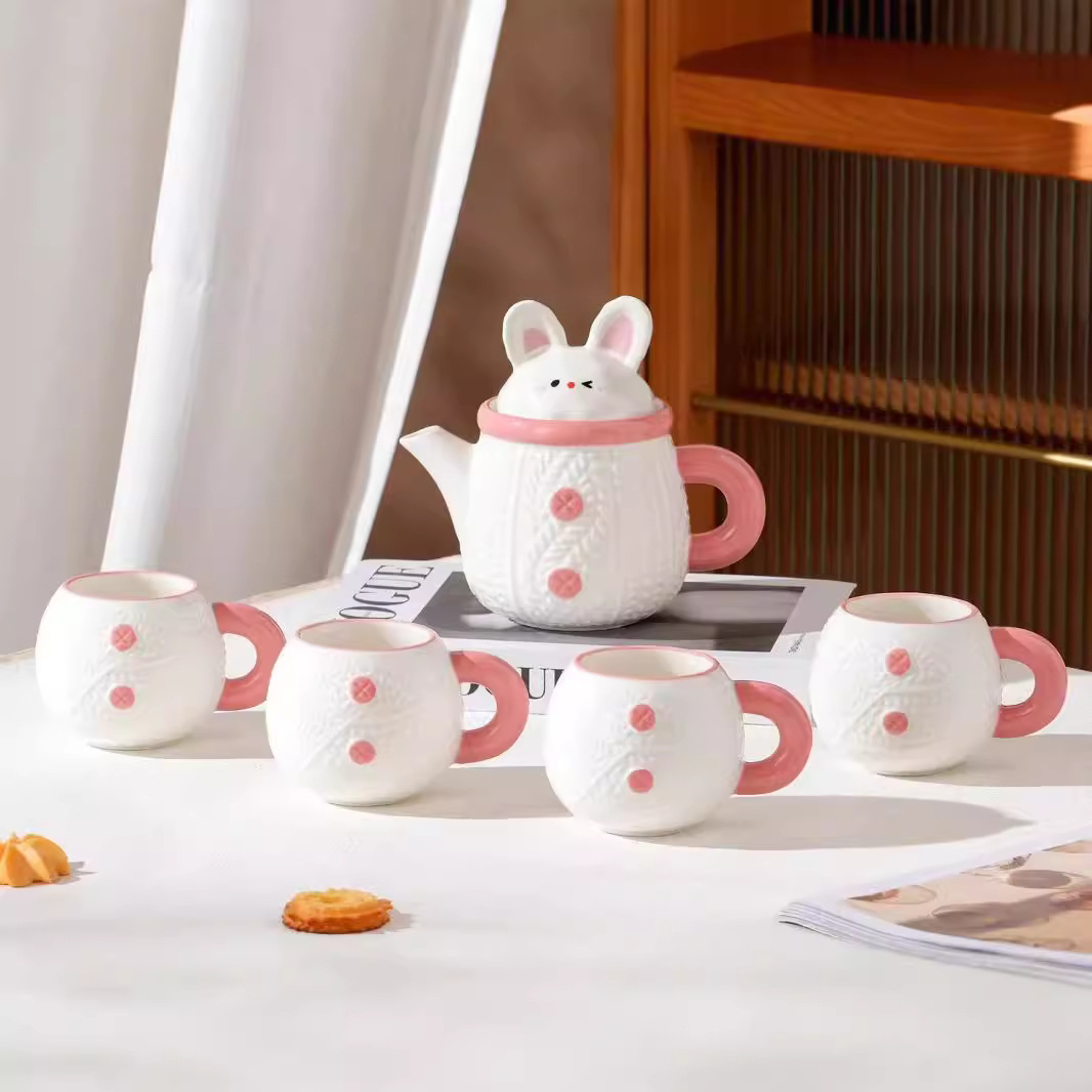 Creativo y lindo conejo hervidor de cerámica taza de agua doméstica de alto valor de cara con regalo de mano para niñas con un conjunto de tazas de agua