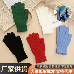 秋冬はカシミヤの純色の保温手袋に似せています。