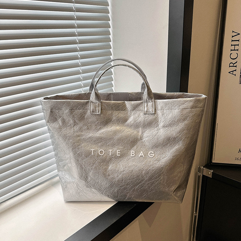 Bolso de papel DuPont popular de este año 2025 nuevo bolso de gran capacidad de moda de primavera bolso femenino de compras de ocio