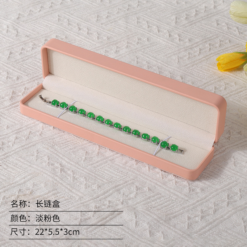 Caja de joyería rosa de alta calidad de cuero pu caja de embalaje de marca de joyería logotipo colgante pulsera collar caja de anillo
