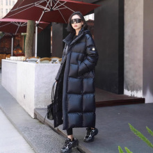明星同款鹅绒羽绒服女2025新款过膝长款情侣同款高端加厚保暖外套
