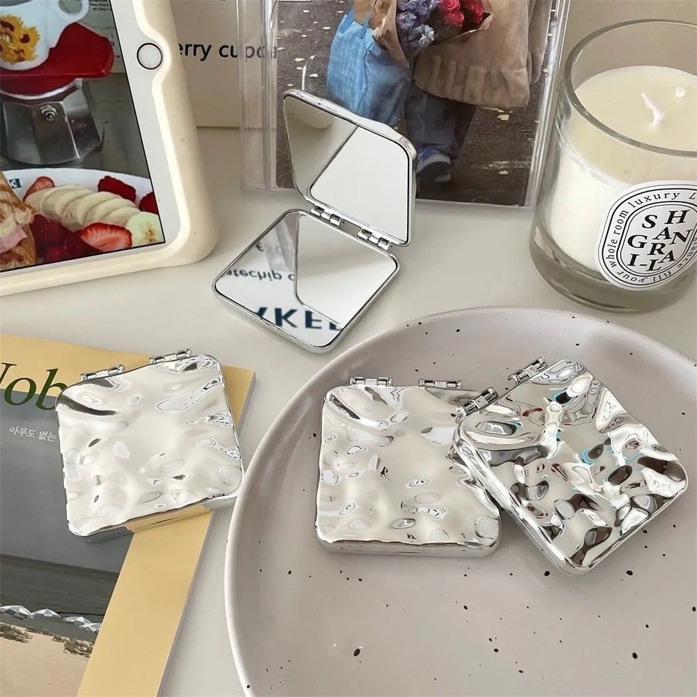 Handheld double-sided folding small mirror