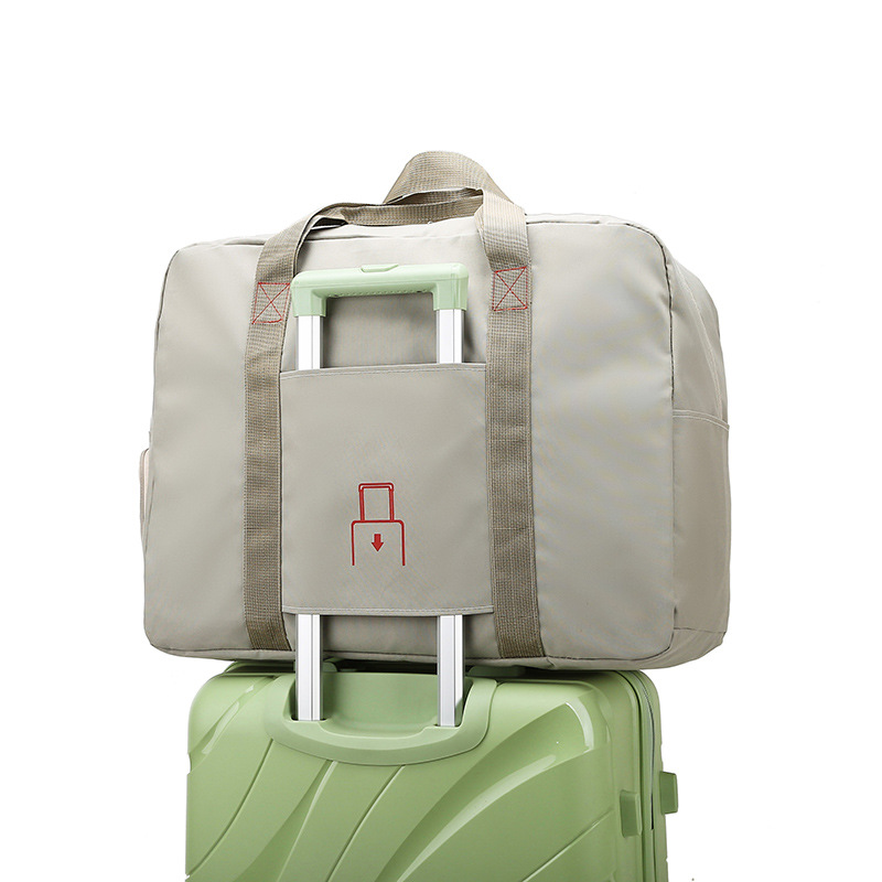 Bolsa de almacenamiento de ropa de mano de tela Oxford Bolsa de almacenamiento de viaje plegable Bolsa impermeable Bolsa de equipaje de corta distancia Bolsa de viaje