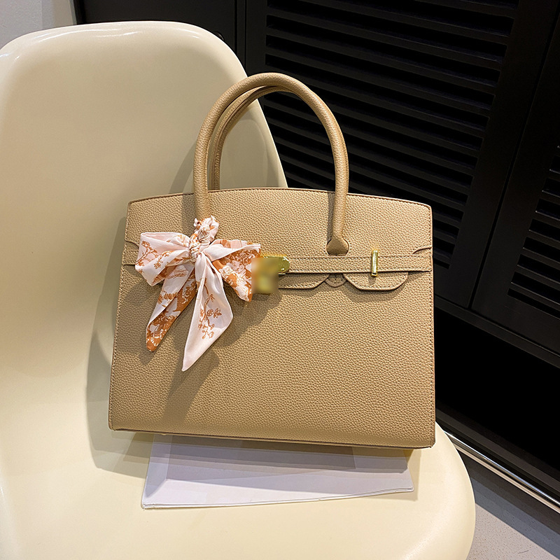 Gran capacidad de Kelly bolso para mujeres 2026 nuevo nicho de lujo viaje ligero bolso de hombro de alta sensación bolso de mujer