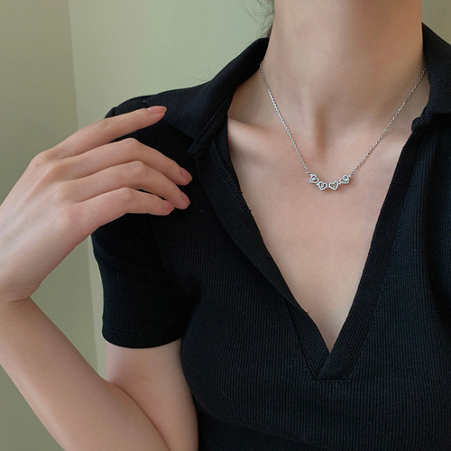 Titanium steel necklace, micro-set full zirconium clover heart pendant, minimalist luxury design women's summer social media collar necklace