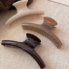スターの同じタイプのクリップは酢酸の黒色の髪をまねて大きいサイズのアーチの形の髪をつかんで新型のサメを挟んで高級感を挟みます。