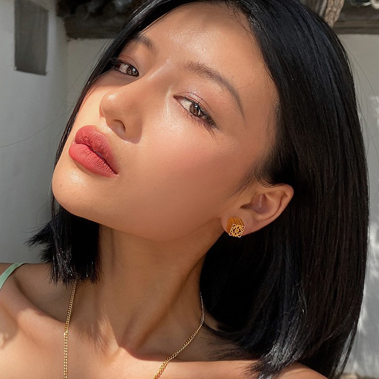 Luo Jia same style brass gold-plated solid stud earrings female temperament light luxury niche design sense high quality European and American earrings batch