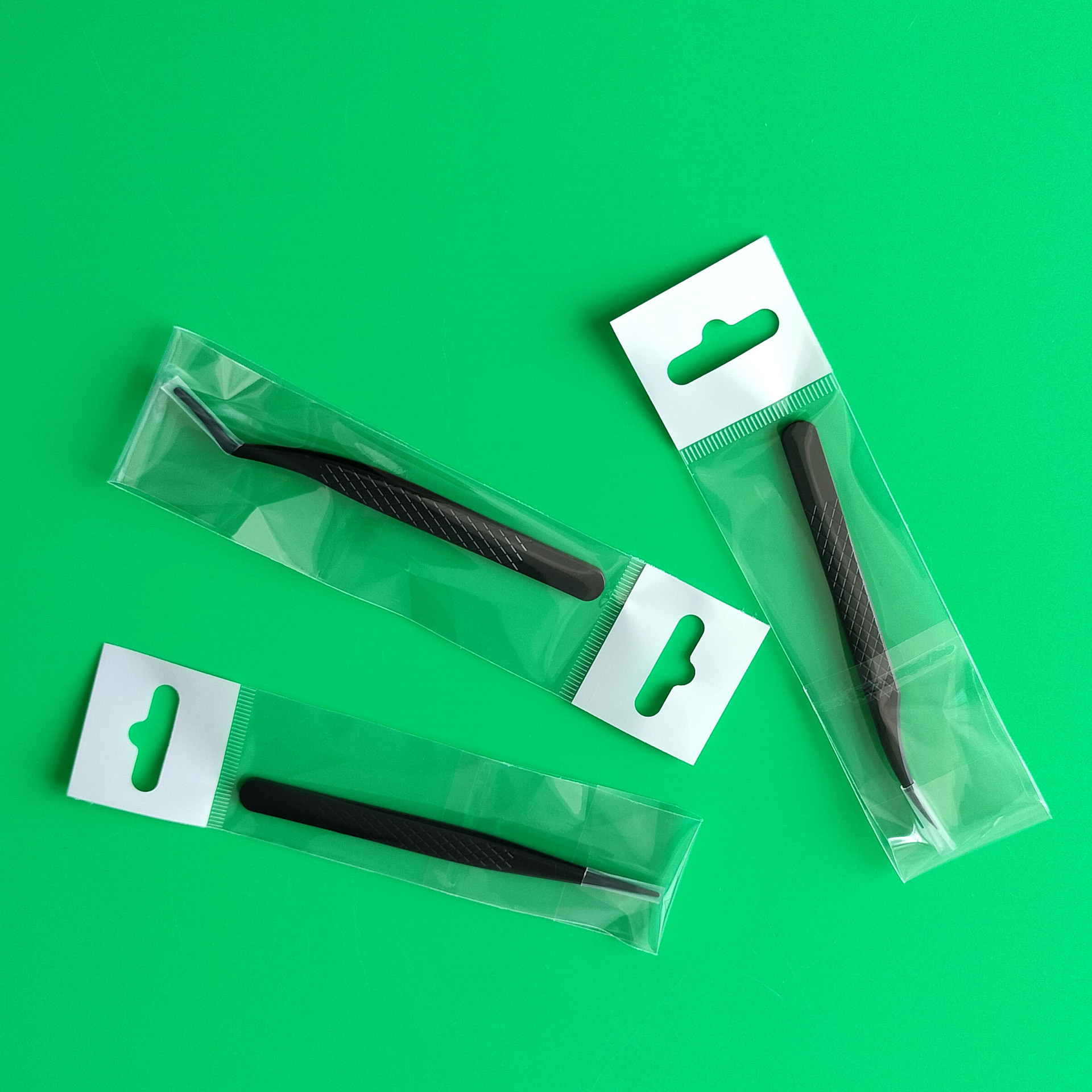 Suministro transfronterizo clip de pluma de oro antideslizante mini pinzas de injerto de malla pinzas de pestañas de injerto pinzas de floración bolsa opp