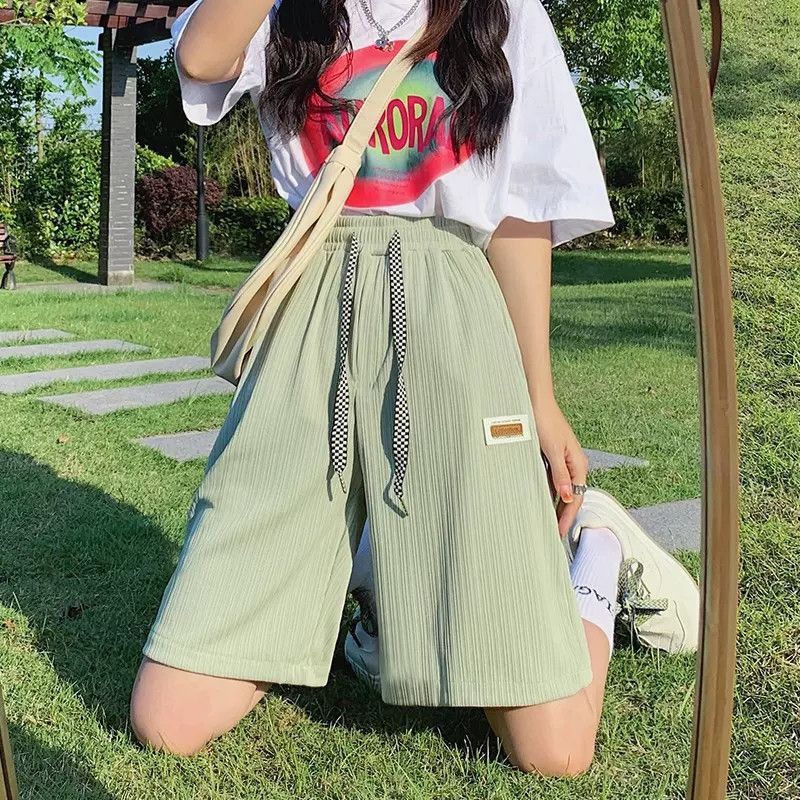 氷の糸のストレートのズボンの女性の夏の薄いタイプの外は速乾性のカジュアルなズボンのファッションを着ています。|undefined