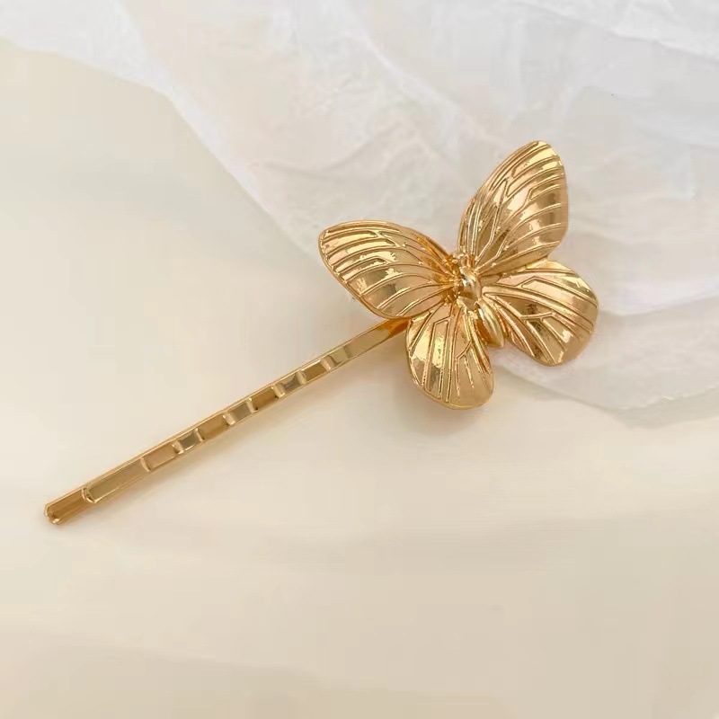 Golden small hair accessory