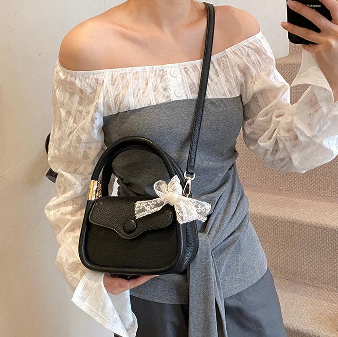 Casual tendencia portátil mini bolso 2025, nuevo nicho de bolso de hombro universal, sensación de alto nivel, simple mochila para mujeres