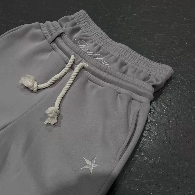 国境を越えた欧米の両腰の刺繍の衛ズボンの男女の潮のブランドの高い街の長ズボンの偽の2つのズボンのゆったりしている広腿のズボン|undefined