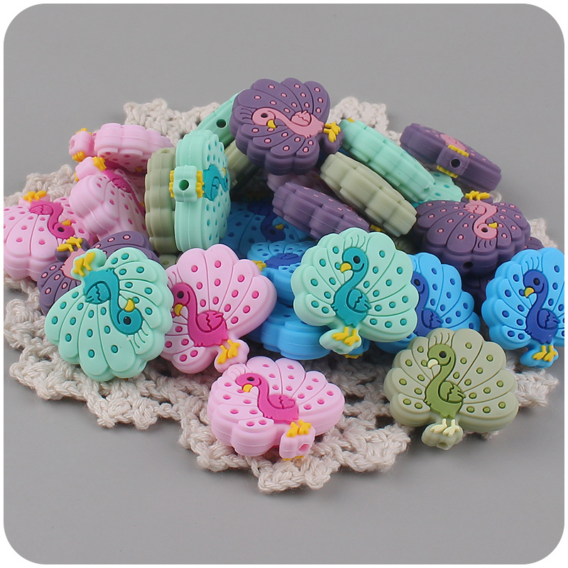 Bebé suministros de dibujos animados animal Pavo Real silicona mordedor creativo DIY bebé molar pezón anti-gota cadena Accesorios