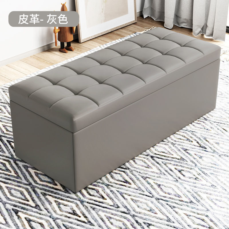 洋服屋の試着室の長いソファーの腰掛けの収納棚の長方形の靴の腰掛けの家の入り口は大人に座ることができます。|undefined