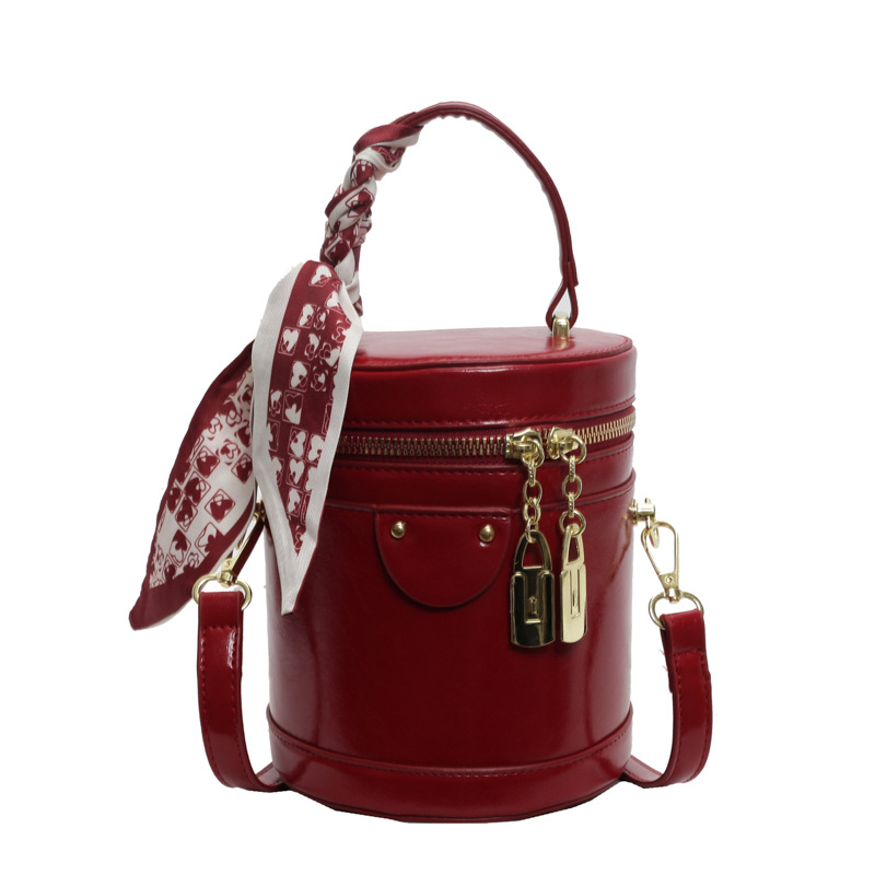 Bolso de cubo popular de este año, nuevo bolso de verano 2025, bolso de hombro de alta gama, bolso de mensajero retro de todo fósforo para mujer