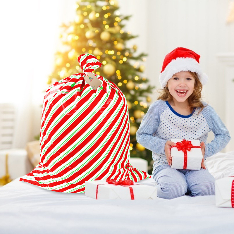 En stock comercio electrónico transfronterizo nueva bolsa de regalo de Navidad PE bolsa de regalo de plástico bolsa de regalo de Navidad