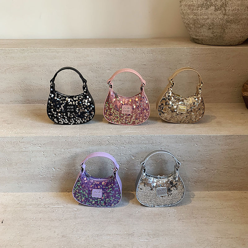 Bolsos de hombro para niñas coreanas, mini lindos bolsos de mano con sequillas de aire extranjero, bolsos de mano para niños, primavera y verano nuevos bolsos de mochila para niños.