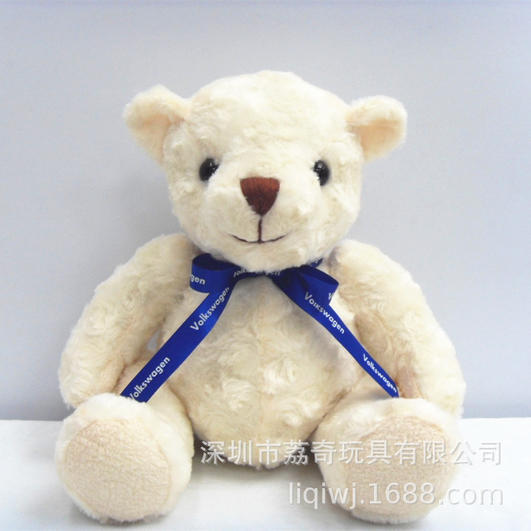 White doll with bow