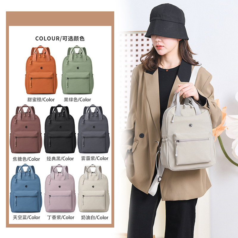 Mochila de tela de nailon de color sólido de moda transfronteriza, nueva moda, todo fósforo, mochila de viaje para mujer de gran capacidad