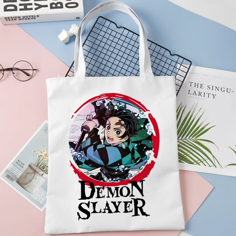 Comercio exterior transfronterizo Demon Slayer impresa bolsa de lona Harjuku bolsa de hombro bolsa de compras portátil de moda para estudiantes