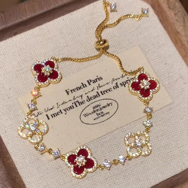 Light Luxury Lucky Four-Leaf Clover Bracelet Micro-Encrusted Zircon Hollow High-End Hand Jewelry Women's Niche Fashion Jewelry Wholesale